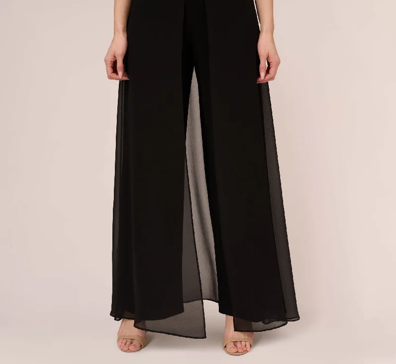 Jersey Jumpsuit With Chiffon Capelet And Skirt Overlay In Black